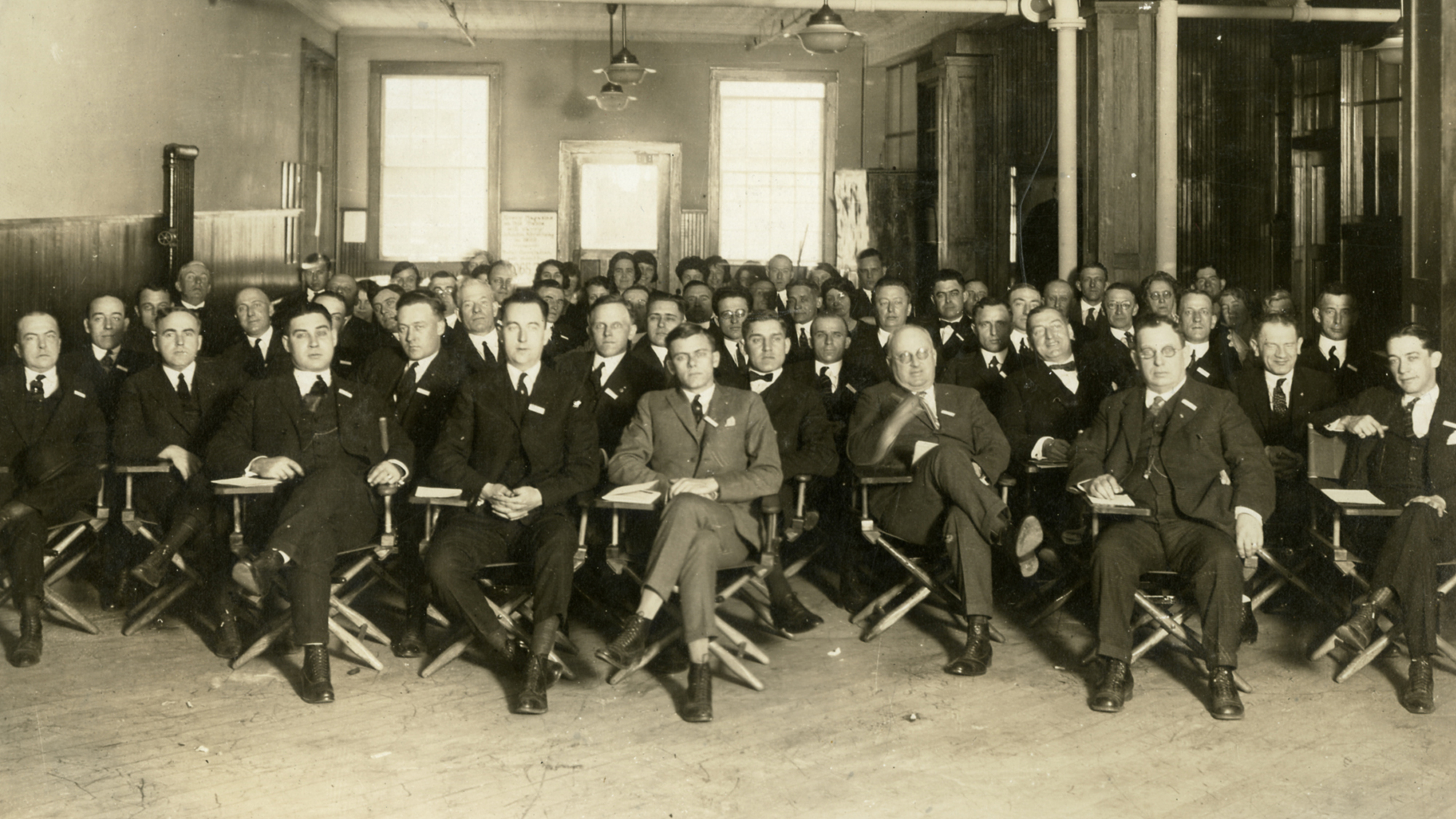 Herbert F. Johnson sitting front row at SC Johnson
