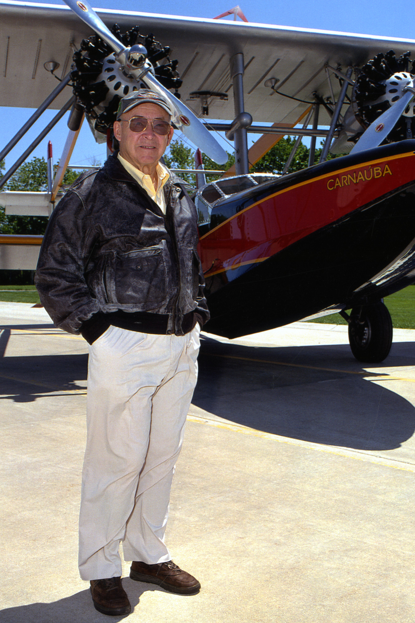 Sam with Carnauba Plane Sam Johnson standing with Carnauba Amphibian Plane